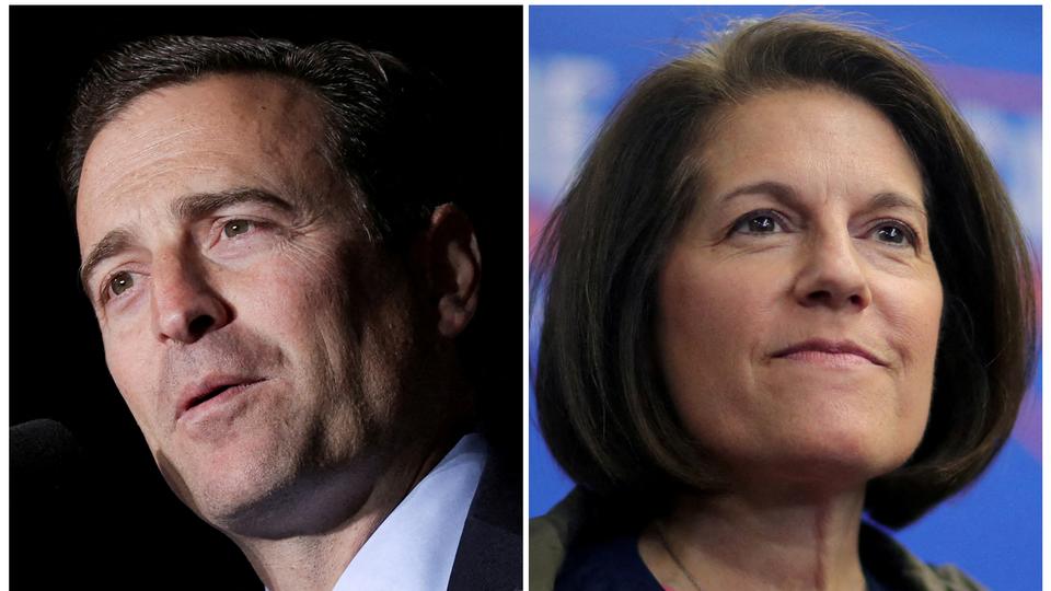 Republican Adam Laxalt (L) was leading by just 800 votes against Democrat Catherine Cortez Masto on November 12 morning.