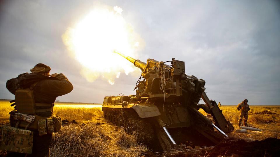 A self-propelled artillery vehicle fires near Bakhmut, Donetsk region, Ukraine, Thursday, Nov. 10, 2022.