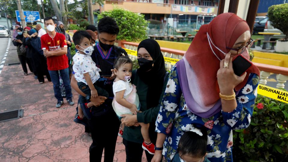 Malaysians face soaring food prices, and parts of the country continue to be battered by flash floods due to monsoon rains.