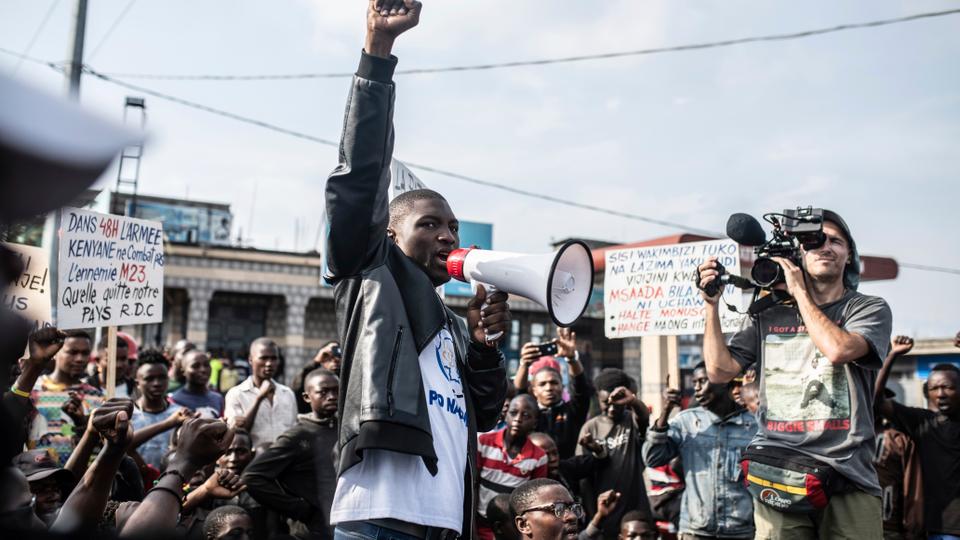 Goma residents join in a protest called by the civil society against the United Nations mission to the Democratic Republic of Congo and the current conflict between government forces and M23 rebels, in Goma, Dec. 1, 2022.