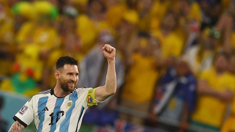 Argentina's Lionel Messi celebrates scoring their first goal against Australia.