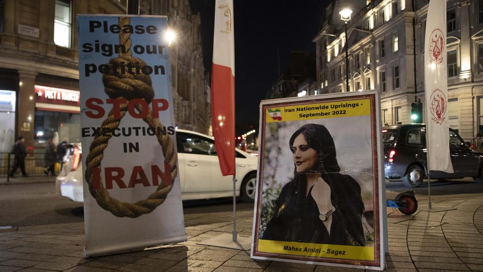 People gather for a solidarity demonstration for Iranian protestors on December 21, 2022 in London, United Kingdom.