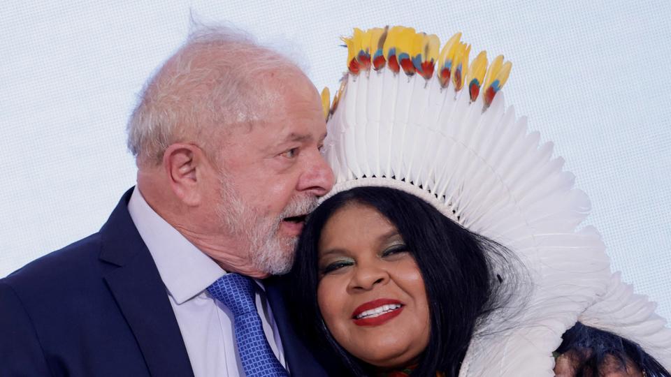 Brazil's President Lula da Silva greets new Minister of Indigenous Peoples Sonia Guajajara during her inauguration ceremony in Brasilia.