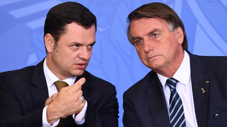 Like his former boss Bolsonaro [R], Torres was in the United States when the riots erupted, and is expected back in Brazil any day.