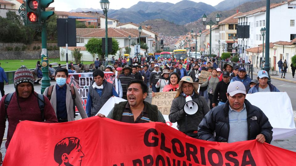 People take part in demonstration before heading to Lima to gather with protesters from around the country for  