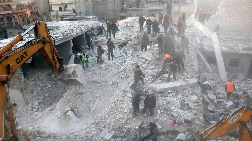 Dozens of firefighters, first responders, and residents covered in debris and dust are searching through the rubble for the survivors.