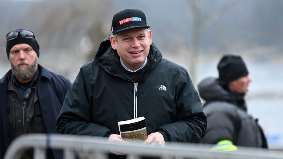 The leader of the far-right Danish political party Stram Kurs, Swedish-Danish extremist Paludan is pictured while holding a copy of the Quran, the central religious text of Islam, while staging a provocation outside the Turkish Embassy in Stockholm, Sweden, on January 21, 2023.