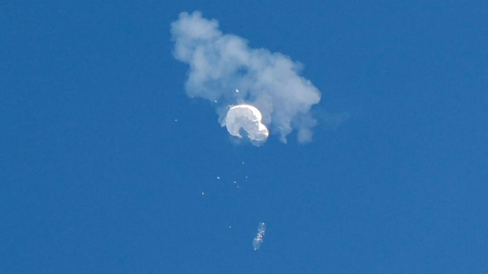 Suspected Chinese spy balloon drifts to ocean after being shot down off the coast in Surfside Beach, South Carolina.