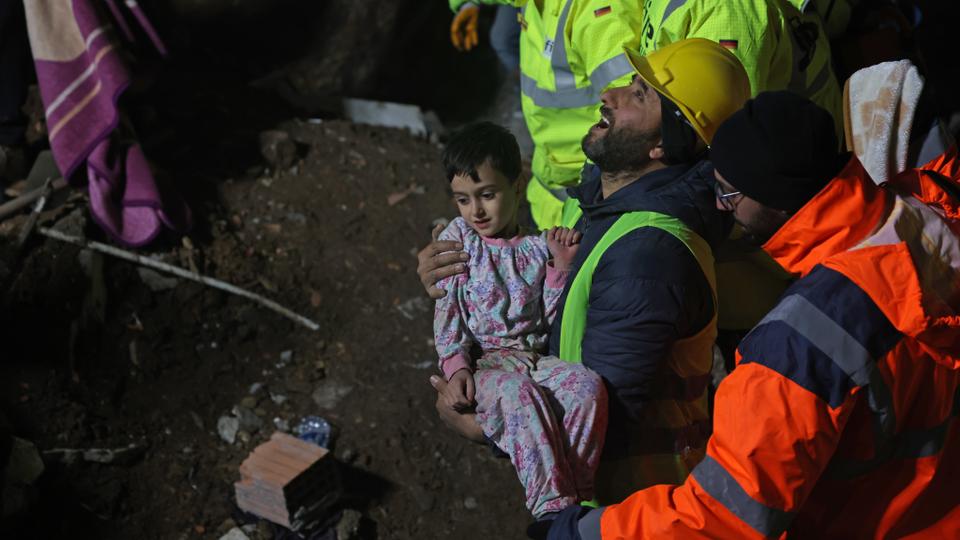 A 33 year-old mother, Serap Topal and her 5 year-old son, Mehmet Hamza Topal are rescued by the German and British rescue teams from under the rubble after 68 hours.