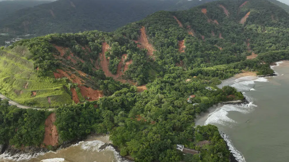 Rio-Santos highway, which connects the cities of Rio de Janeiro and Santos is blocked by mudslides triggered by heavy rains near the Barra do Sahi beach in the coastal city of Sao Sebastiao.