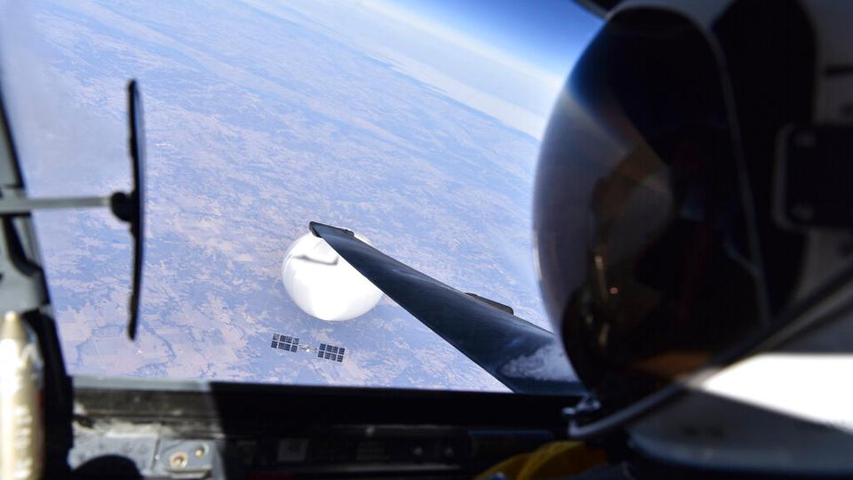 In this image released by the Department of Defense on Wednesday, Feb. 22, 2023, a U.S. Air Force U-2 pilot looks down at a suspected Chinese surveillance balloon as it hovers over the United States on Feb. 3, 2023