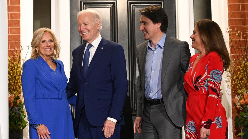 Canadian PM Justin Trudeau and his wife Sophie Gregoire Trudeau greet US President Joe Biden and first lady Jill Biden as they arrive at Rideau Cottage in Ottawa.