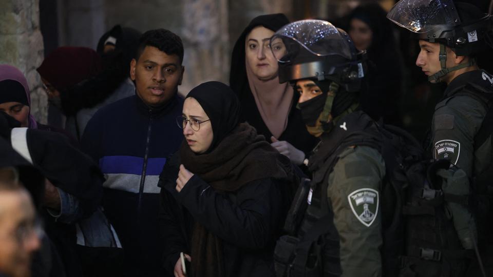 Israeli forces are seen during the expulsion of worshipers from Al Aqsa mosque compound in occupied East Jerusalem's Old City on Wednesday night.