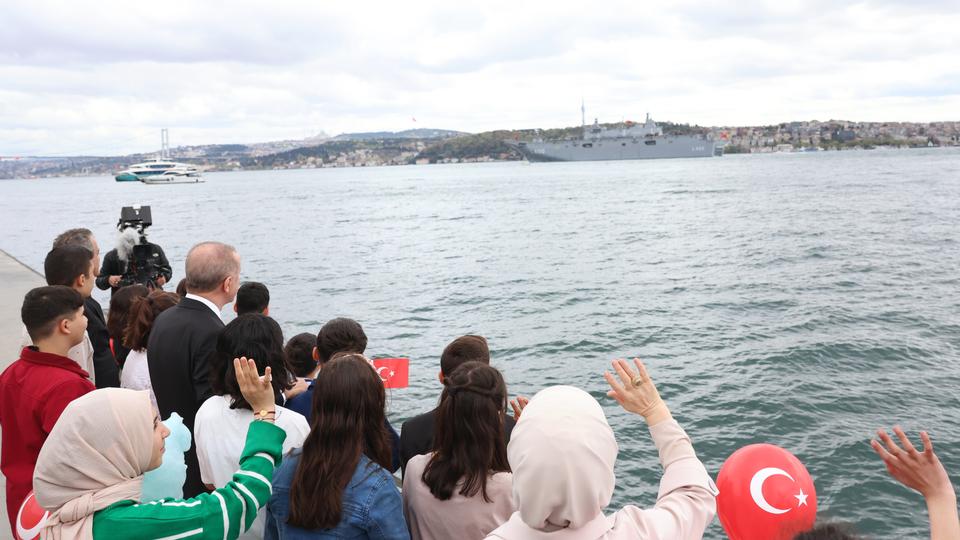 President Erdogan and first lady Emine Erdogan, accompanied by children from Türkiye’s southern quake-hit areas, were out on deck of Dolmabache Palace to see off the vessel as it sailed on the Bosphorus Strait.