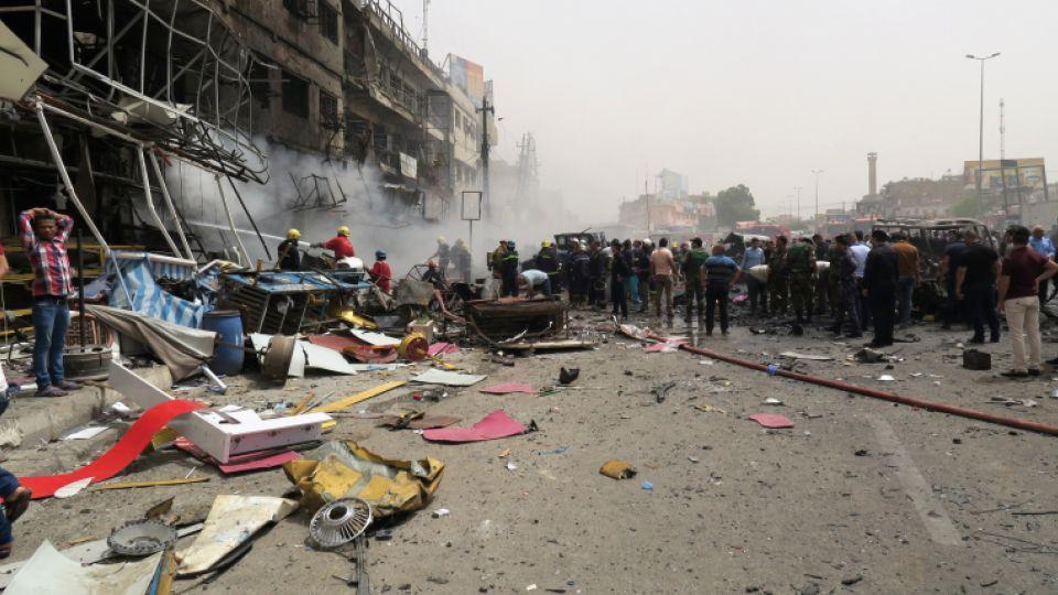 Twin car bombings kill 27 in Baghdad