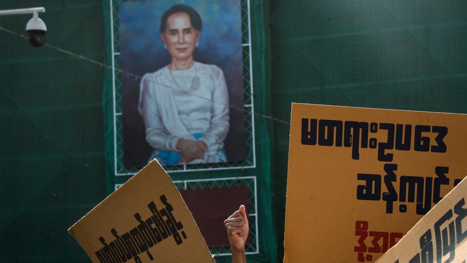 A portrait of Myanmar's state counselor Aung San Suu Kyi is seen as activists demonstrate against what they believe are repressive additional sections contained within the Myanmar Peaceful Assembly and Procession Act, in Yangon on March 5, 2018.