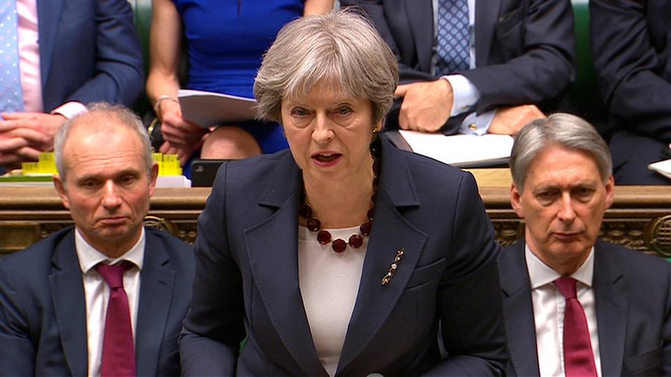 Britain's Prime Minister Theresa May addresses the House of Commons on her government's reaction to the poisoning of former Russian intelligence officer Sergei Skripal and his daughter Yulia in Salisbury, in London, March 14, 2018.