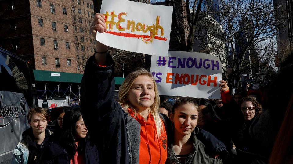 Students from Fiorello H Laguardia High School march away from their school in support of the National School Walkout in the Manhattan borough of New York City, New York, US, March 14, 2018.