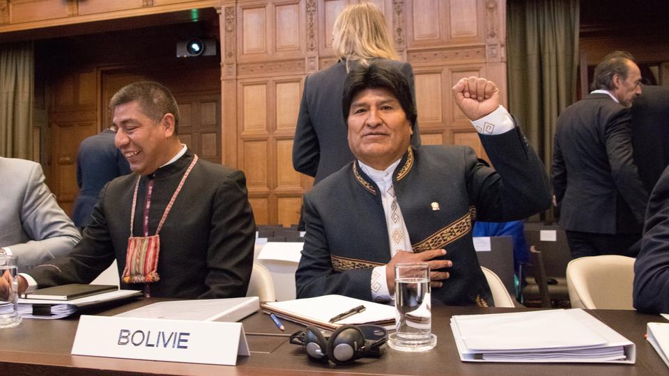Bolivian President Evo Morales gestures as he arrives for the opening of hearings at the World Court in The Hague, Netherlands March 19, 2018.