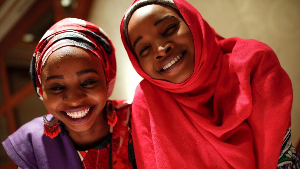 Hauwa (L) and Ya kaka, identified only by their first names, former captives of Boko Haram militants in Nigeria and now acting as advocates speaking out on behalf of other captives and survivors, pose for a portrait after they appeared on a panel dealing with issues of violence against women in New York City, US, March 13, 2018.