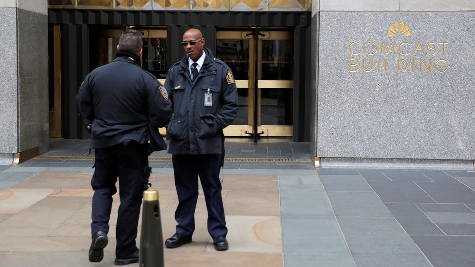 Police and security stand outside 30 Rockefeller Plaza in New York, the location for the offices of US President Donald Tump's lawyer Michael Cohen. April 9, 2018.