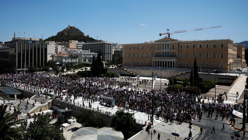 Members of the communist-affiliated PAME take part in a demonstration marking a 24-hour general strike against against planned austerity measures in front of the parliament building in Athens, Greece, on May 30, 2018.