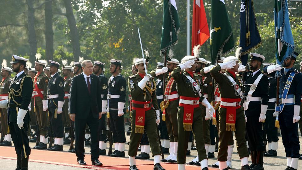 In this November 17, 2016 file photo, Turkish President Recep Tayyip Erdogan inspects a military honour guard during a ceremony in Islamabad, Pakistan.