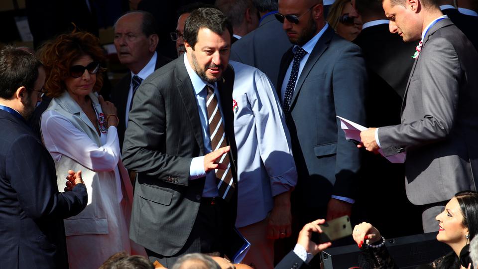 Italy's Interior Minister Matteo Salvini (center) arrives at the Republic Day military parade in Rome. Not long afterwards eh said migrants should start packing their bags.