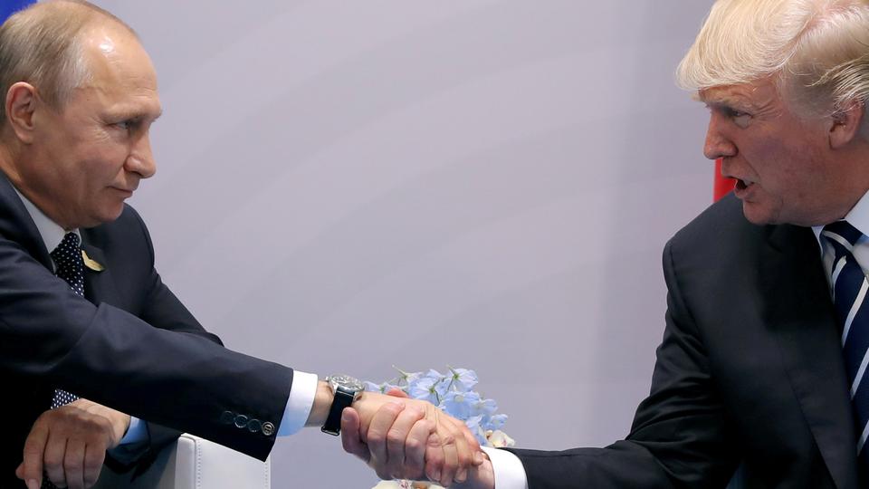 U.S. President Donald Trump shakes hands with Russian President Vladimir Putin during the their bilateral meeting at the G20 summit in Hamburg, Germany, July 7, 2017.