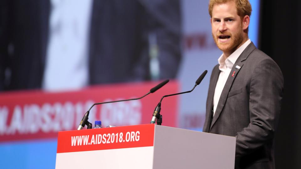 Britain's Prince Harry addresses a panel 