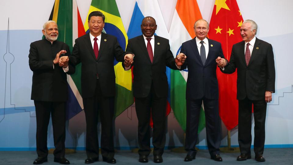 Indian Prime Minister Narendra Modi, China's President Xi Jinping, South Africa's President Cyril Ramaphosa, Russia's President Vladimir Putin and Brazil's President Michel Temer pose for a group picture at the BRICS summit meeting in Johannesburg, South Africa, on July 26, 2018.