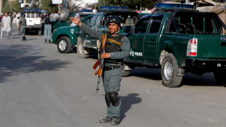 Afghan policemen arrive at the site of a suicide bomb attack in Kabul, Afghanistan on August 15, 2018.
