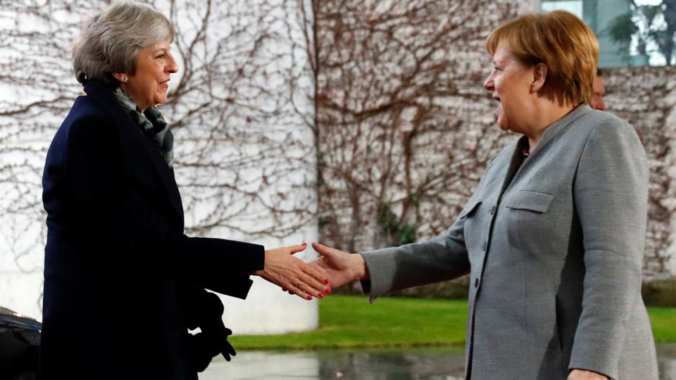 British Prime Minister Theresa May is welcomed by German Chancellor Angela Merkel at the Chancellery in Berlin, Germany on December 11, 2018.