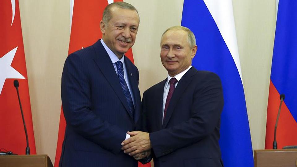 Turkish President Recep Tayyip Erdogan (L) and Russian President Vladimir Putin (R) shake hands after a joint press conference in Sochi, Russia on September 17, 2018.