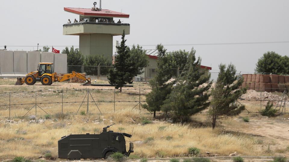 Turkish soldiers stand on a watch tower at the Atmeh crossing on the Syrian-Turkish border, as seen from the Syrian side, in Idlib governorate, Syria May 31, 2019.