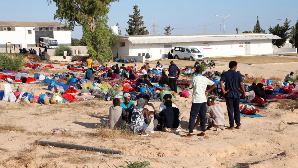 Migrants are seen with their belongings at the yard of a detention centre for mainly African migrants, hit by an airstrike, in the Tajoura suburb of Tripoli, Libya July 3, 2019.
