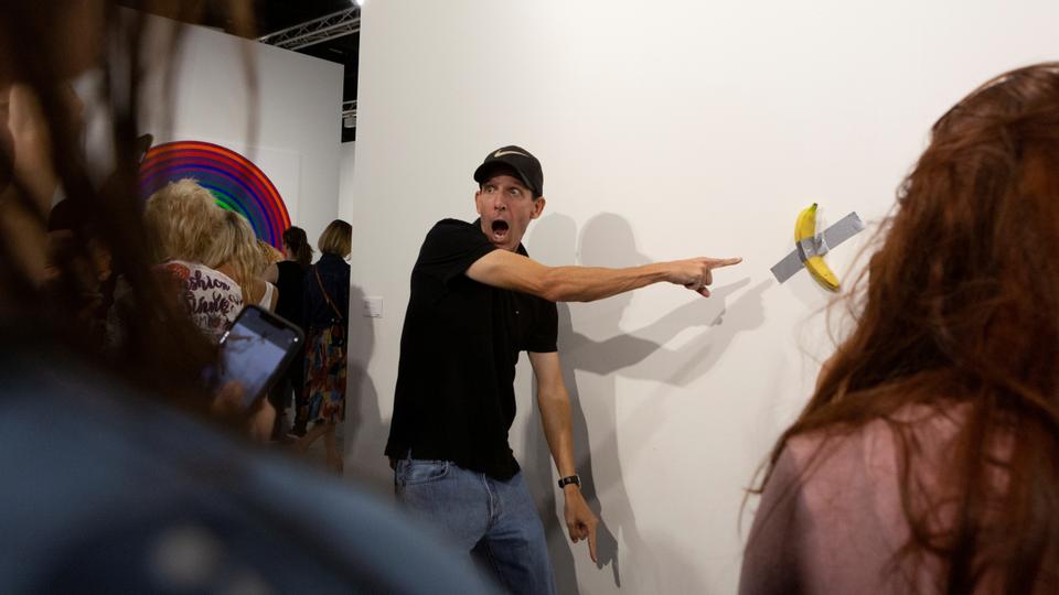 Man eats $120,000 piece of art - a banana taped to wall