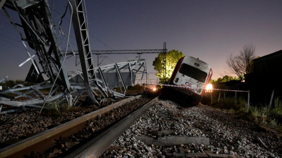 A derailed train carriage is seen toppled in the town of Adendro in northern Greece, May 14, 2017. 