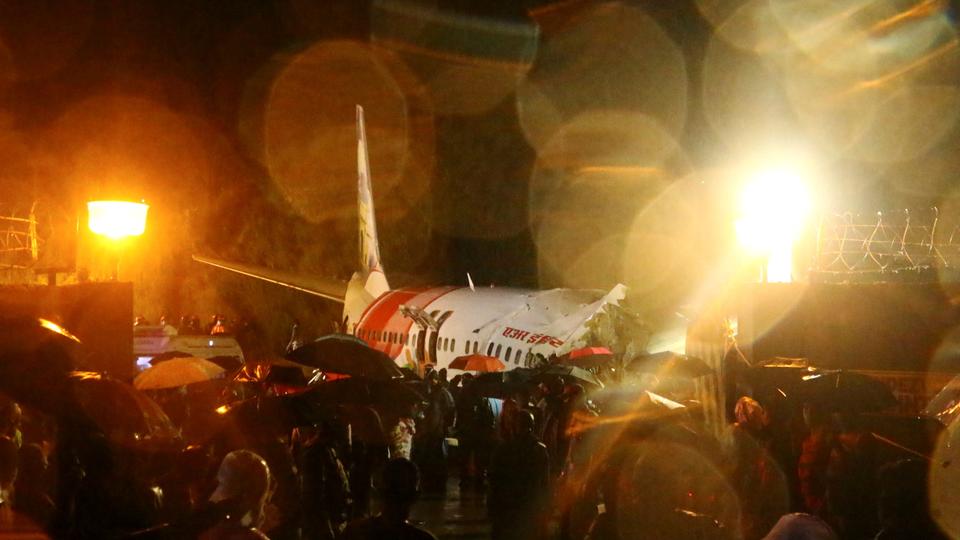 plane skids off runway and breaks apart in india killing several