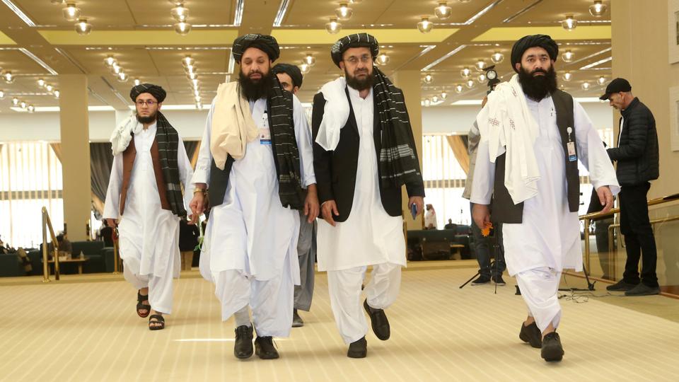 Afghanistan's Taliban delegation arrive for the agreement signing between Taliban and US officials in Doha, Qatar, Saturday, February 29, 2020.