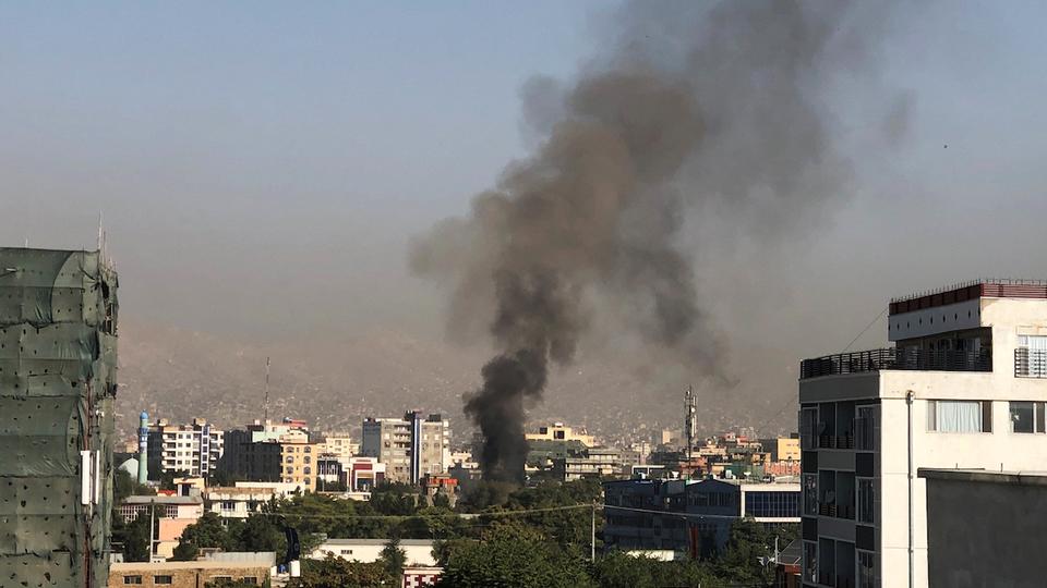 A smoke plume rises following an explosion targeting the convoy of Afghanistan's vice president Amrullah Saleh in Kabul on September 9, 2020.