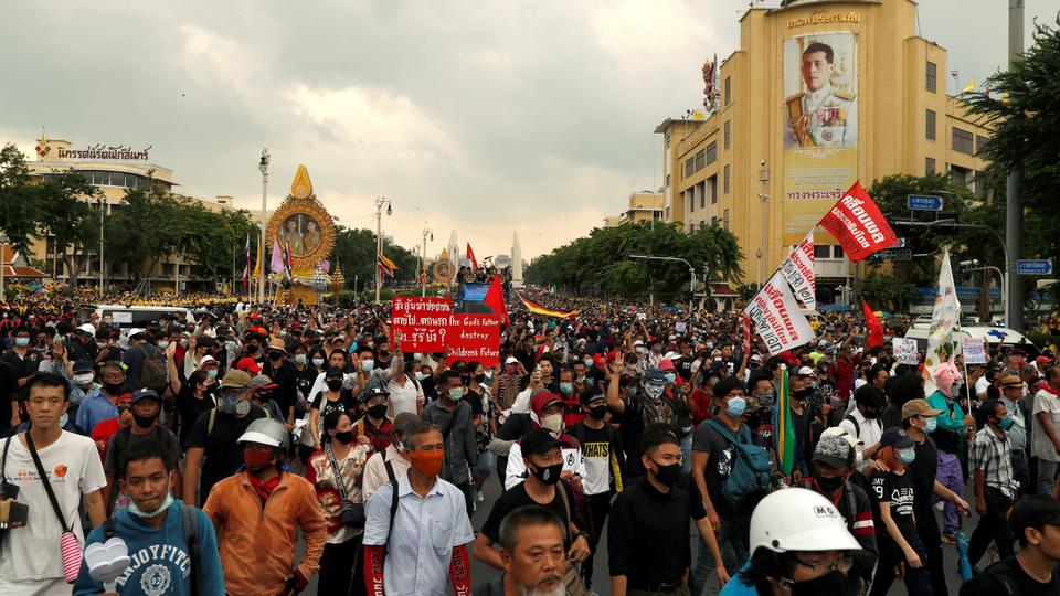 Demonstrators in Bangkok, Thailand, march during a Thai anti-government mass protest on the 47th anniversary of the 1973 student uprising. October 14, 2020.
