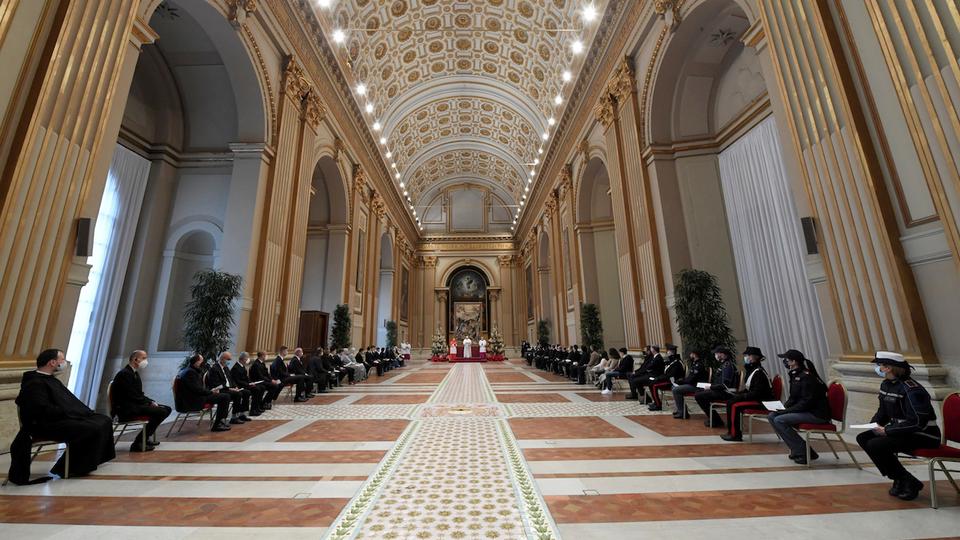Pope Francis delivers his traditional Christmas Day Urbi et Orbi speech to the city and the world virtually from inside the Hall of Blessings at the Vatican, December 25, 2020.