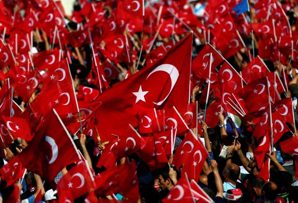 People wave Turkish flags during a rally to mark the 563rd anniversary of the conquest of the city by Ottoman Turks, in Istanbul, Turkey, May 29, 2016. 