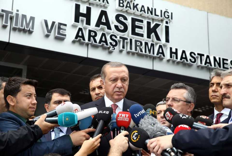 President Recep Tayyip Erdogan talks to reporters after visiting the blast victims in a hospital in Istanbul on June 7, 2016.