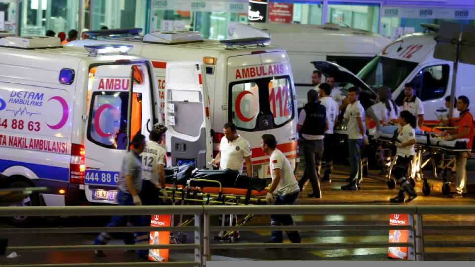 Paramedics push a stretcher at Turkey's largest airport, Istanbul Ataturk, Turkey, following a blast June 28, 2016.