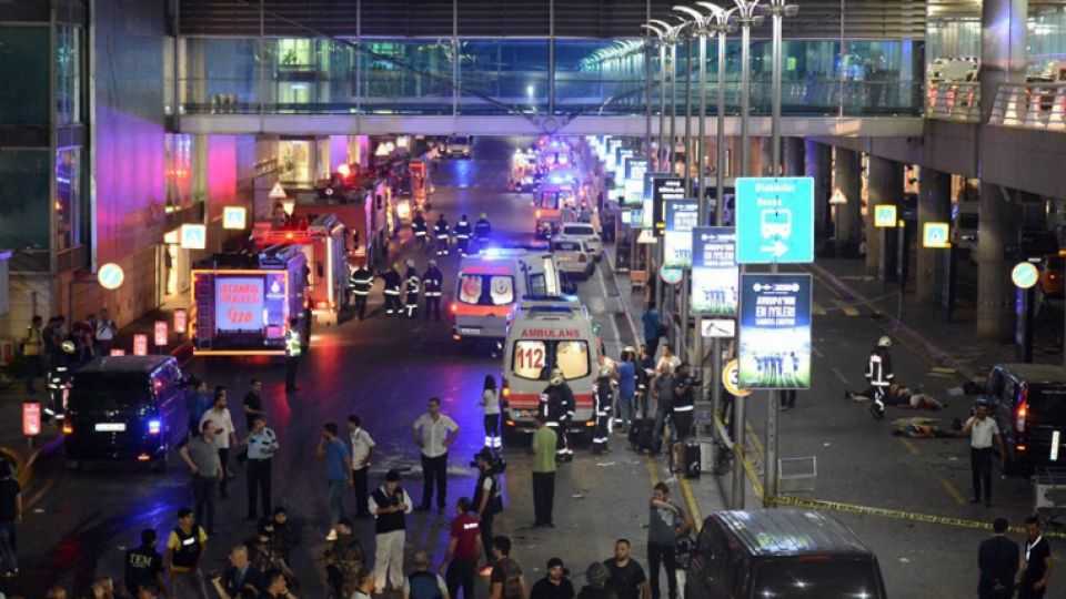  Medics and security members working at the entrance of the Ataturk Airport after explosions.