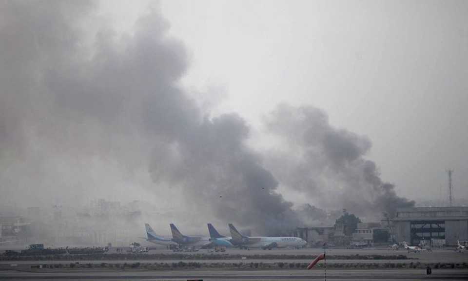 Smoke rises from Jinnah International Airport, Karachi after terrorists' attack on June 9, 2014.