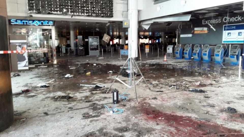 Damage is seen inside the departure terminal following the March 22, 2016 bombing at Zaventem Airport