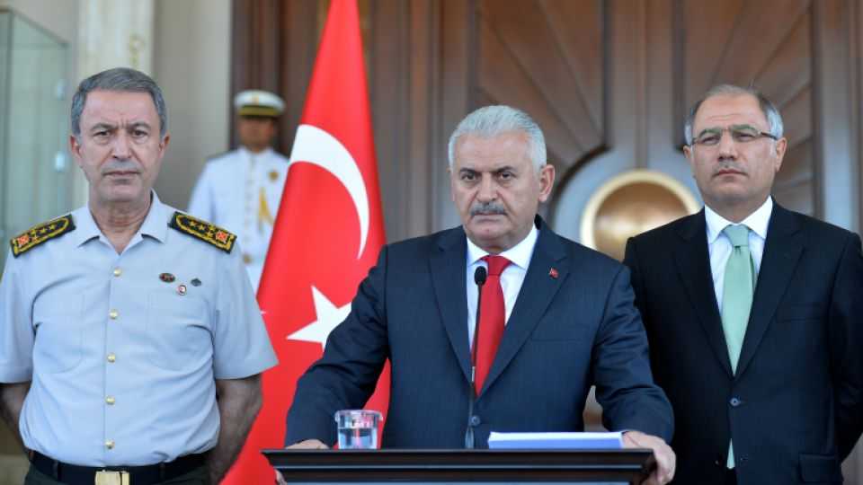 Chief of Staff General Hulusi Akar, Turkey's Prime Minister Binali Yildirim and Interior Minister Efkan Ala (LtoR) address a news conference, following an overnight attempted Turkish military coup, in Ankara, Turkey July 16, 2016. 